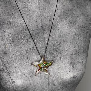 pendant necklace costume jewelry Long glass starfish silver tone background red